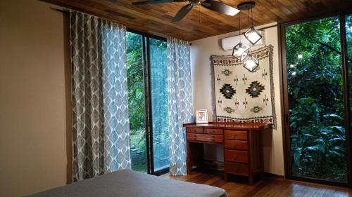 Cama ou camas em um quarto em Villas Corcovado-AC-Jacuzzi-Pool-Great Views-Nature-Relaxing