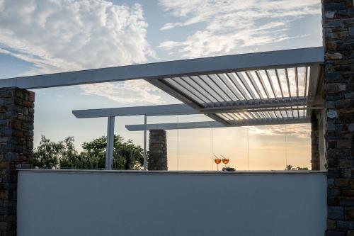 awning over a white wall in front of a building at Blumarea in Agropoli