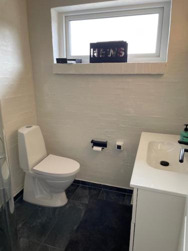 Un baño de Coasthouse ved havet