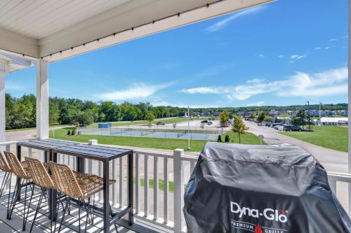 a balcony with a table and chairs and a view of a park at A View to a Chill in Ottawa