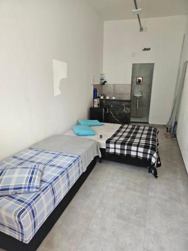 Postel nebo postele na pokoji v ubytování Apartamento Aparecida do Norte centro