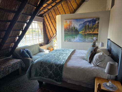 a bedroom with a bed and a large painting on the wall at Lavender Villa No loadshedding in Kempton Park