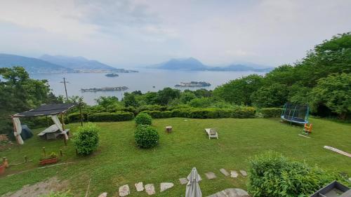 an aerial view of a garden with a view of the water at Shambala Home Casa Luna in Someraro