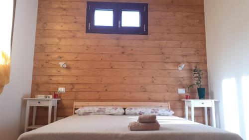 Postel nebo postele na pokoji v ubytování b&b Onda Verde