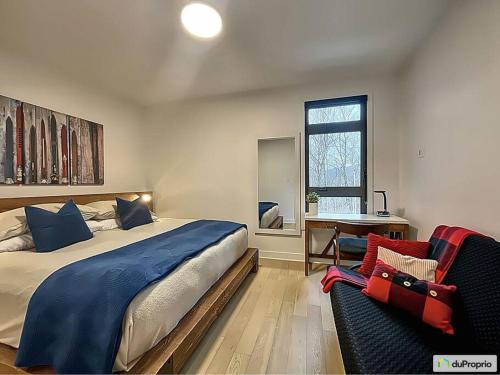 Кровать или кровати в номере Luxury Condo Mont Tremblant Verbier Arnica