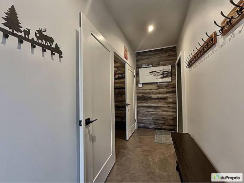 Фотография из галереи Luxury Condo Mont Tremblant Verbier Arnica в Мон-Трамблане