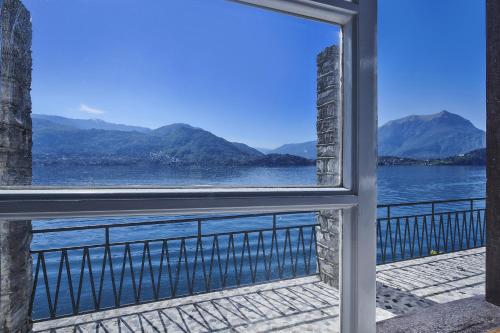 a view of the water from a window at Villa Scoglio in Varenna