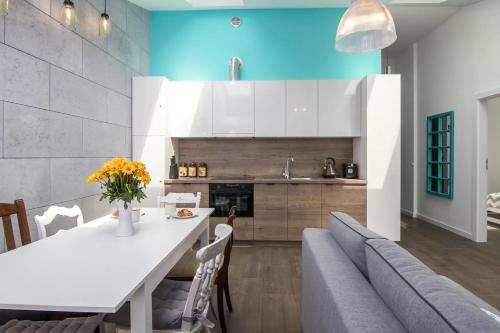 Kuchyňa alebo kuchynka v ubytovaní 2-Bedroom Apartment - Sarego 16