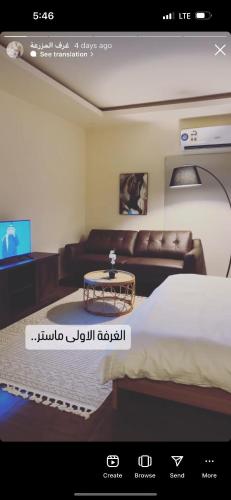 a rendering of a living room with a bed and a couch at Liwa sunrise Farm in Sabkhah
