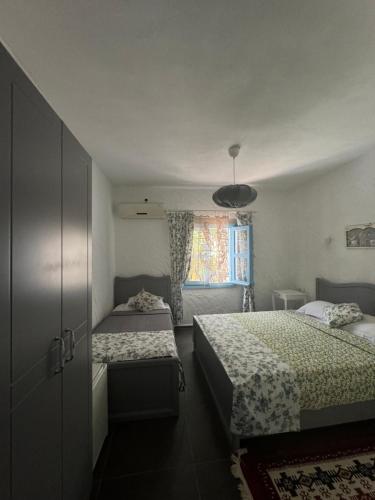 Postel nebo postele na pokoji v ubytování Çakir Bey Hotel