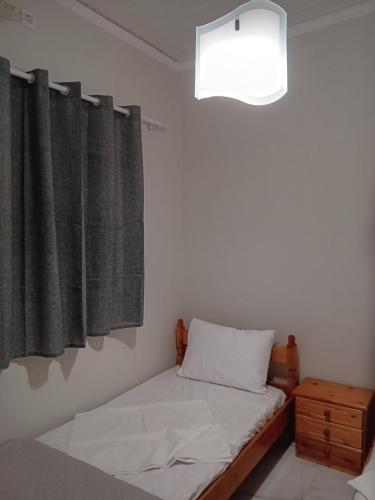 Ένα ή περισσότερα κρεβάτια σε δωμάτιο στο Aris apartment