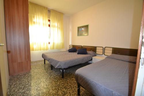 A bed or beds in a room at Campiello