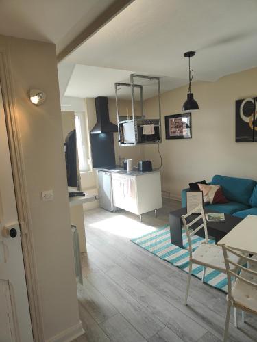 Kuchyň nebo kuchyňský kout v ubytování Résidence Leclerc - Appartements d'hôtes - Secteur thermal