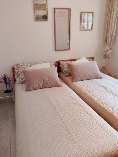 Кровать или кровати в номере Casa Erminia