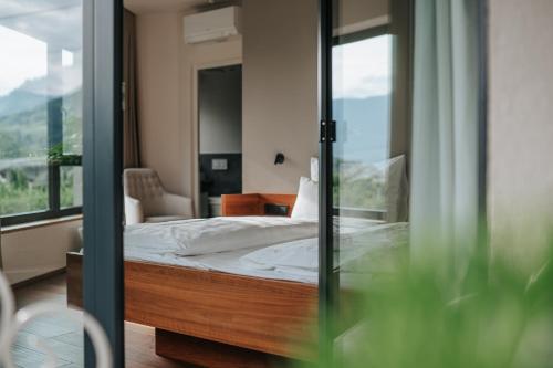 Letto o letti in una camera di Garni-Hotel Der Forsterhof