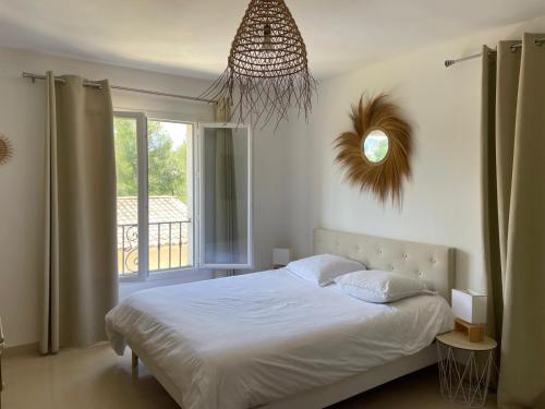 Posteľ alebo postele v izbe v ubytovaní Appartement Villa d'Aurore