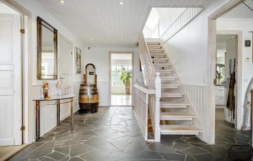 a staircase in a home with white walls at Awesome Home In Hadsund With Wifi in Hadsund