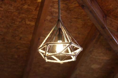 a light fixture hanging from a ceiling at Vila Bajrami in Vlorë