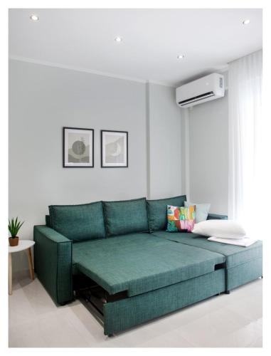 Area soggiorno di Ammoshine Apartment