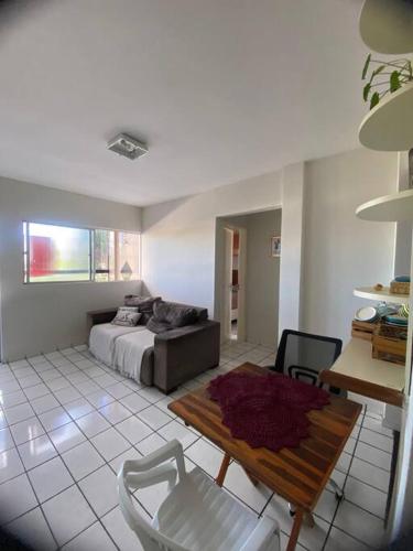 En eller flere senge i et værelse på Apartamento mobiliado