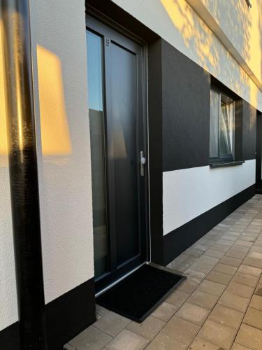 an entrance to a building with a door at RK Apartment Brno in Brno