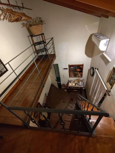 an overhead view of a spiral staircase in a room at Rodia in Kynopiástai