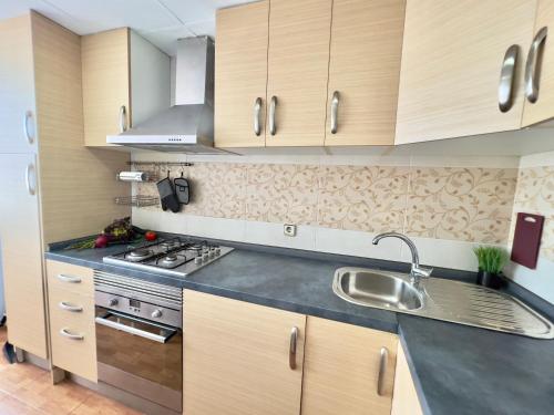 Kuchyň nebo kuchyňský kout v ubytování Nova Mar Bella Apartment