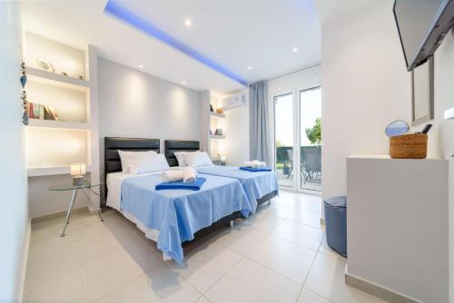 Ένα ή περισσότερα κρεβάτια σε δωμάτιο στο Iphigenia Apartments at Katelios
