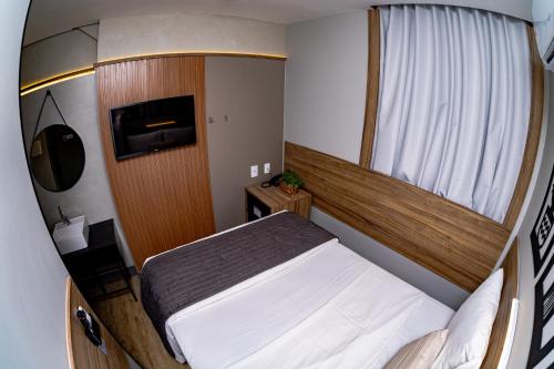 Katil atau katil-katil dalam bilik di Hotel Vila Catavento