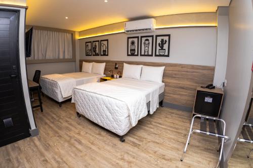 Katil atau katil-katil dalam bilik di Hotel Vila Catavento