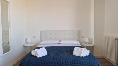 Ένα ή περισσότερα κρεβάτια σε δωμάτιο στο Orlando Rooms