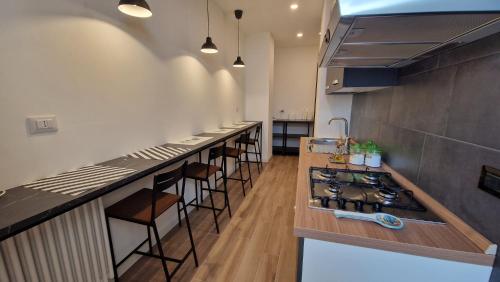 Η κουζίνα ή μικρή κουζίνα στο Orlando Rooms
