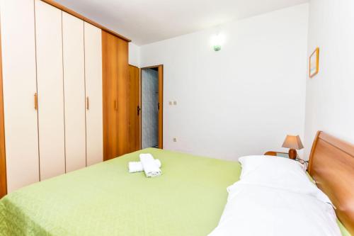Posteľ alebo postele v izbe v ubytovaní Apartment Leo