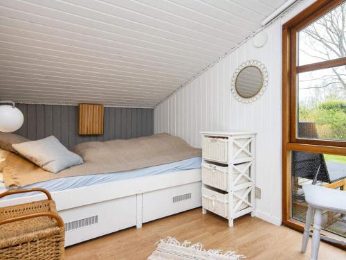 Ένα ή περισσότερα κρεβάτια σε δωμάτιο στο 6 person holiday home in Hemmet-By Traum