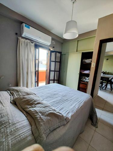 Postel nebo postele na pokoji v ubytování Apart Che Catu III