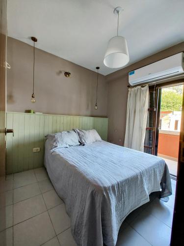 Postel nebo postele na pokoji v ubytování Apart Che Catu III