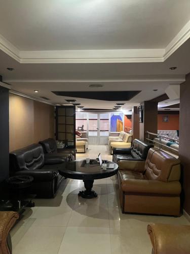 Ruang duduk di Appartement trois chambres
