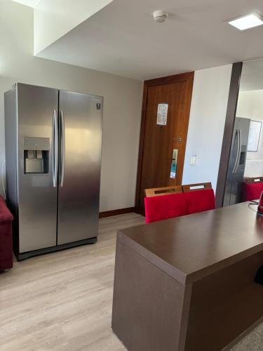 Η κουζίνα ή μικρή κουζίνα στο Bonaparte: flat com suíte, vista incrível e WI-FI
