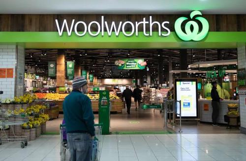 a man standing in front of a woolworths supermarket at Spacious King Size Private Room Pet Friendly in Sydney