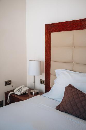 Fratelli Apart Hotelにあるベッド