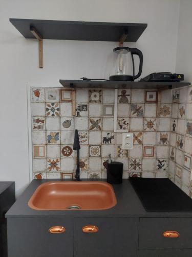 Kuchyň nebo kuchyňský kout v ubytování Kitnet Vila Marcela 1