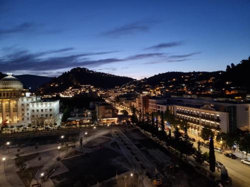 a view of a city at night at KC Apartment 1 in Berat