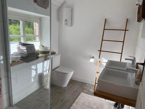 Ruang duduk di Ferienhaus Tante Elses - Ruhe & Erholung zwischen den Meeren - gemütliche & stilvolle Ausstattung