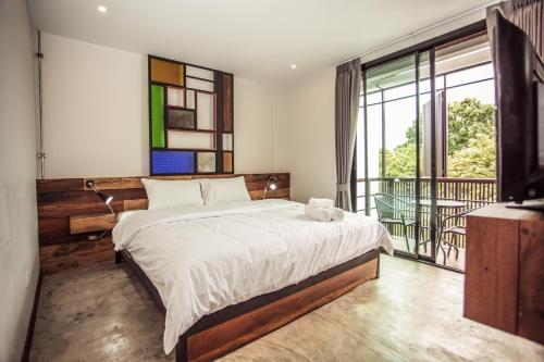 Cama o camas de una habitación en The Arak Bed, Bar and Hostel