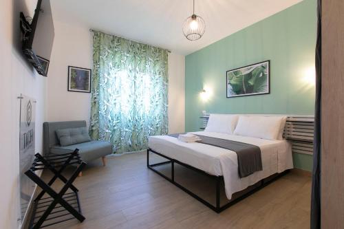 Postel nebo postele na pokoji v ubytování DOMINA Guest House