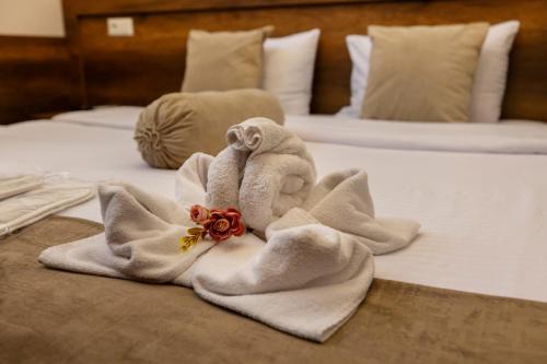 Llit o llits en una habitació de Hestia Boutique Hotel