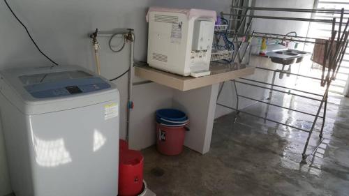 Η κουζίνα ή μικρή κουζίνα στο PKA Homestay - Sewa Bilik