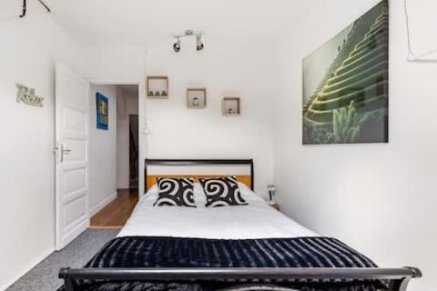 Postel nebo postele na pokoji v ubytování MAISON CENTRE VILLE + GARAGE