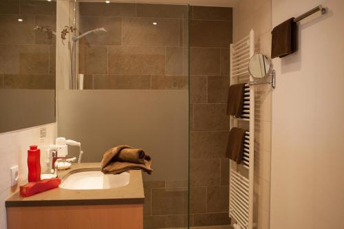 Koupelna v ubytování Hotel Forer