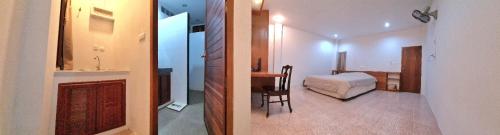 two pictures of a room with a bedroom and a bathroom at Banchang home village in Ban Phayun